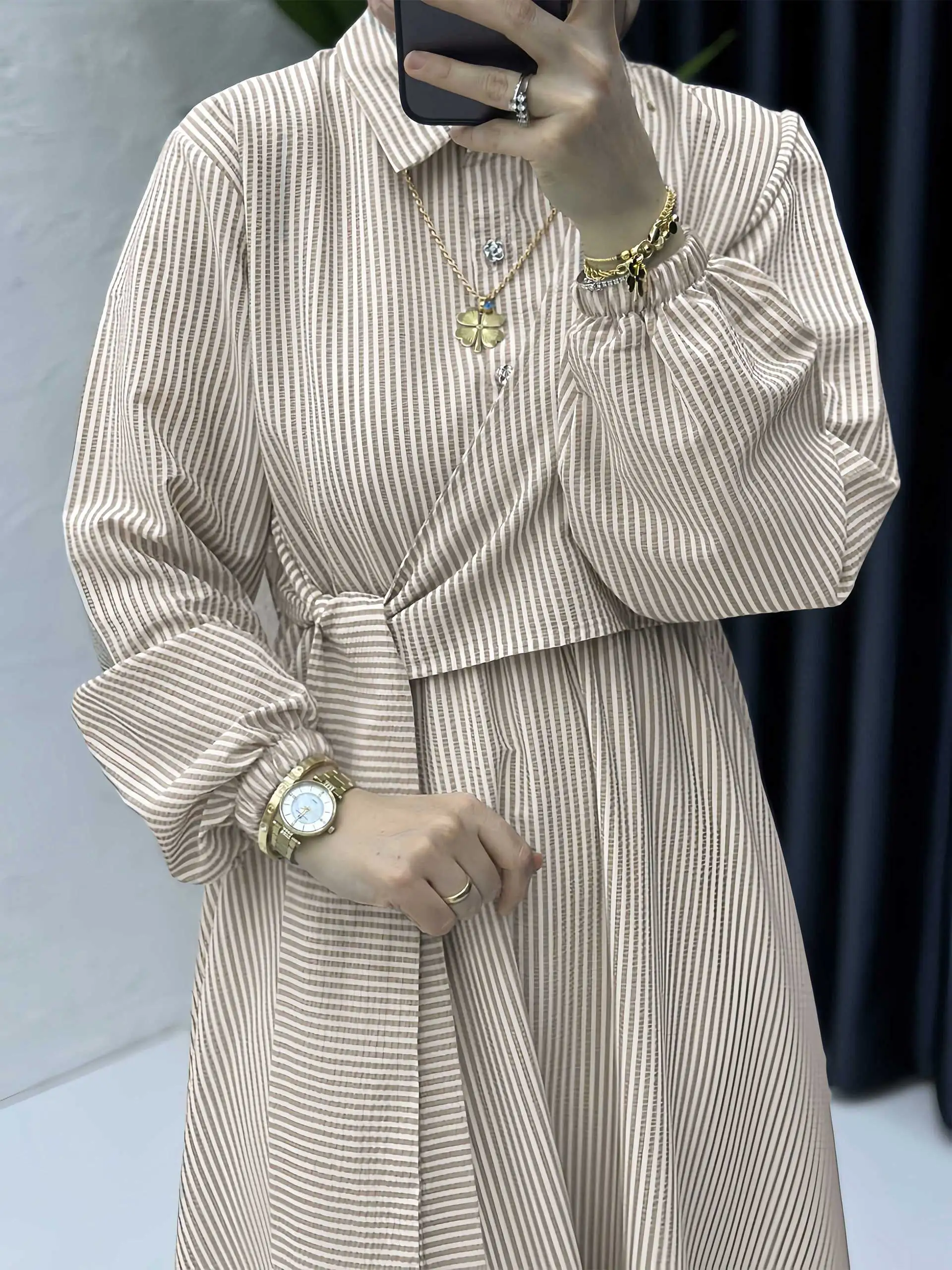 Dubai Inspired Beige Striped Abaya with Shirt Collar and Belted Waist Ideal for Arabian Urban Chic and Mosque Friendly Looks