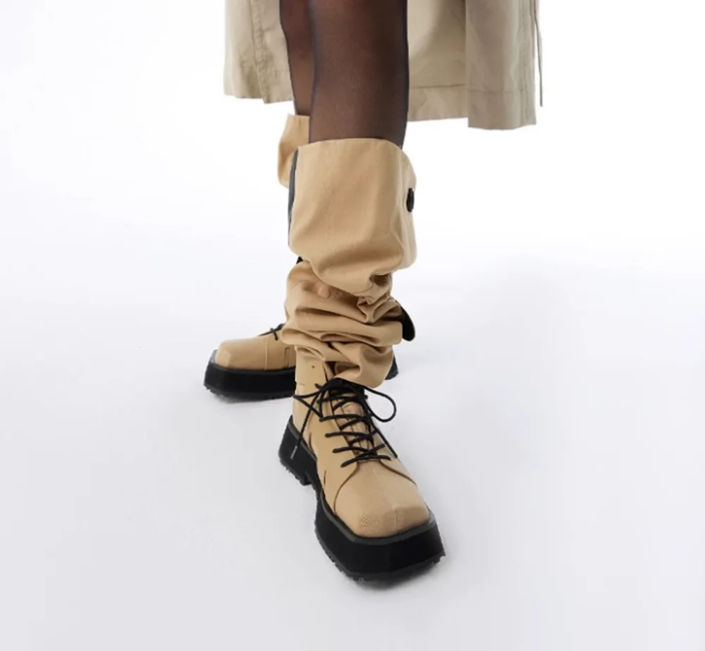

Chunky Black Sole Lace-Up Combat Boots Slouchy Silhouette Adjustable Laces for a Bold Contrast Denim Canvas Knee-High Boots