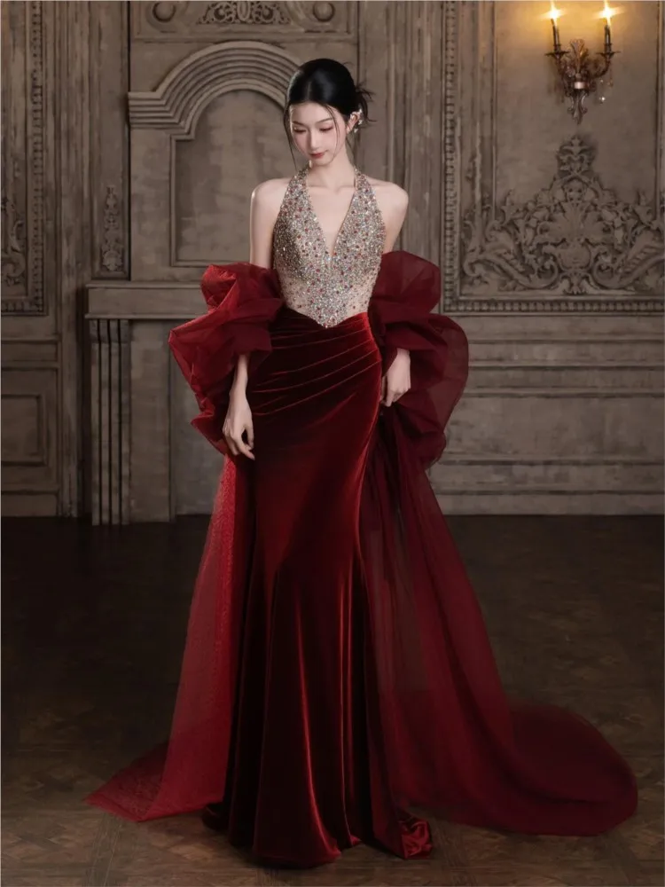 

A new Burgundy heavy industry toasting dress with halter neck