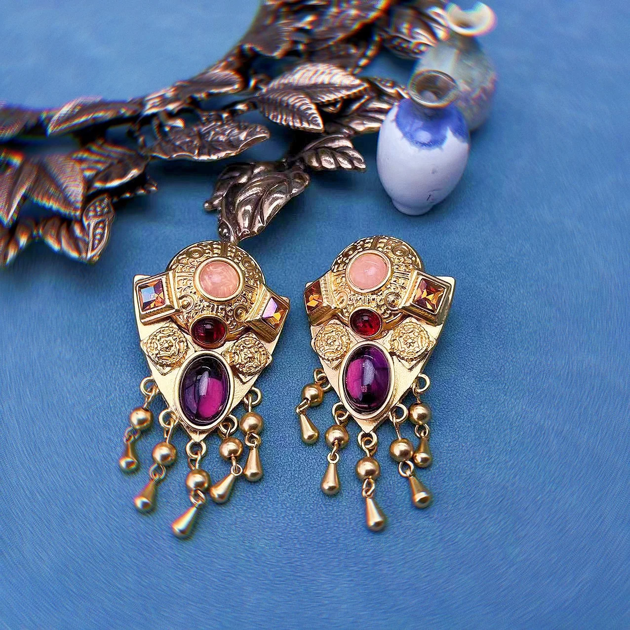 

Retro palace style Western antique luxury purple colored stone earrings