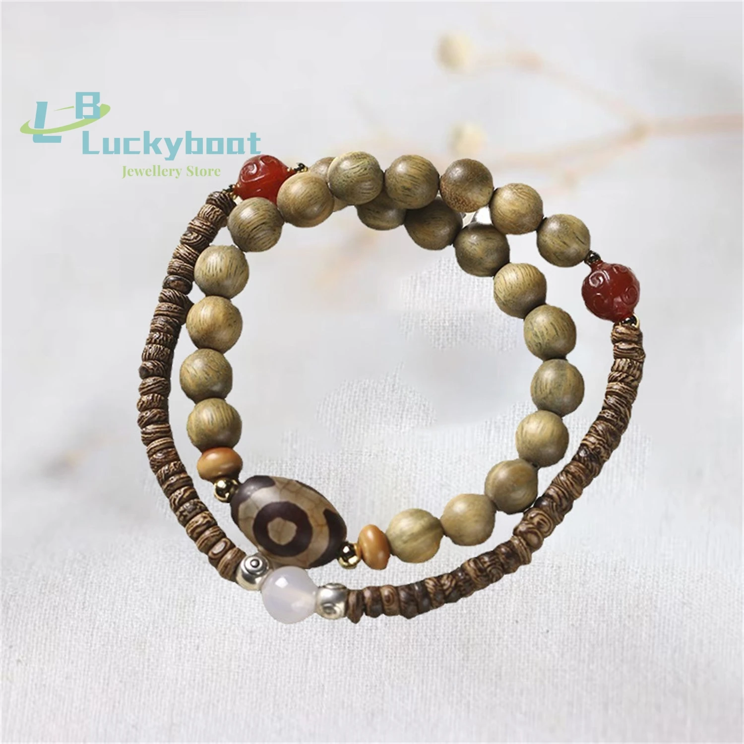 Three eyed Tianzhu agate double loop bracelet with natural golden silk sandalwood splicing chicken wings wooden antique bracelet