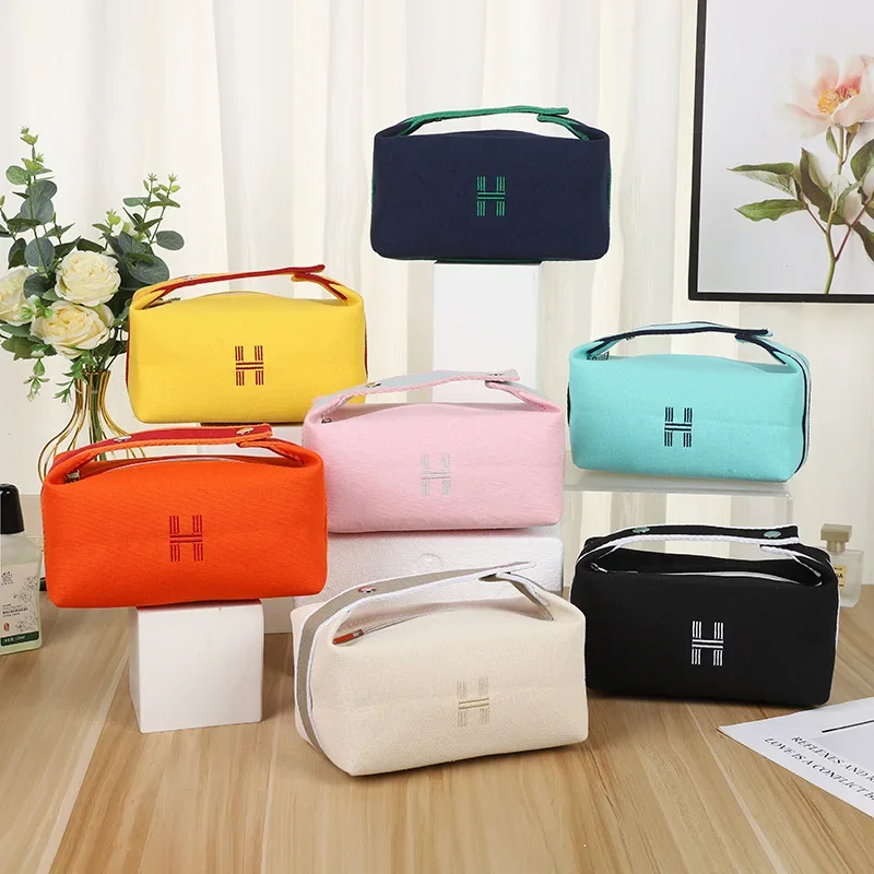 Nueva bolsa de cosméticos, bolso con cremallera a prueba de polvo, Simple y práctico, artículos de tocador para mujer, accesorios de herramientas de almacenamiento, viaje impermeable