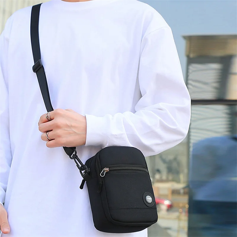 กระเป๋ากระเป๋าสายไหล่เดียวผู้ชายใหม่กระเป๋ากีฬา Crossbody กันน้ำกระเป๋าเป้แฟชั่นขนาดเล็กผ้าใบ Oxford ป้ายแฟชั่น