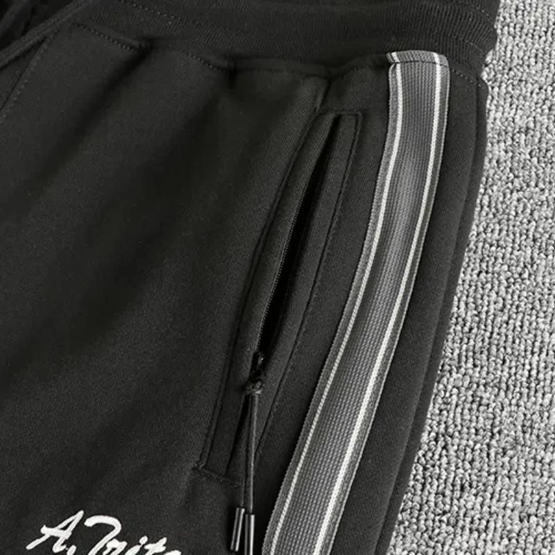 بنطال رياضي كاجوال بشريط بتصميم شق للرجال بنطال رياضي فضفاض بأرجل مستقيمة على الطراز الأمريكي