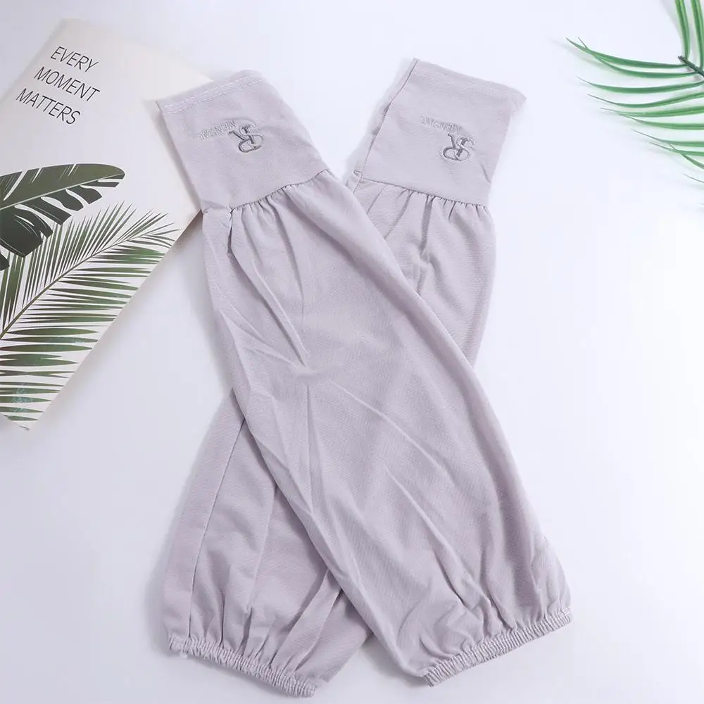 Sarung tangan berkendara lengan tabir surya anti-UV huruf lengan sutra es warna Solid elastis sarung tangan bersepeda penutup pelindung matahari anak perempuan