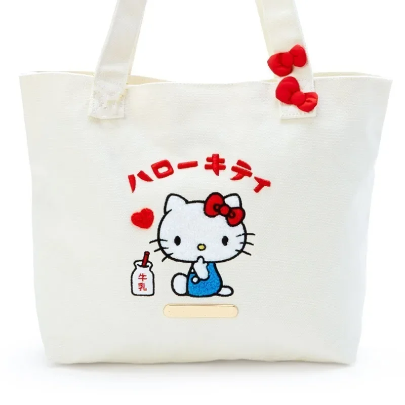 Sanrio-女性のためのハローキティ刺繍ハンドバッグ,学生のショルダーバッグ,女の子のための大きな容量のキャンバスバッグ