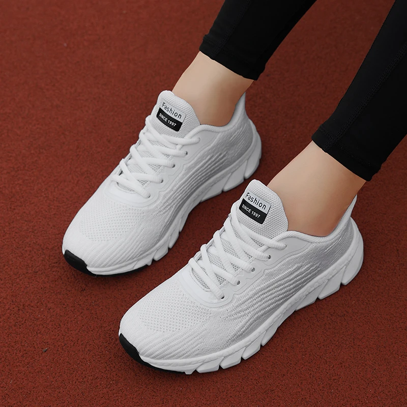 Spring Flying Knitted Breathable Running Shoes Sports Women Casual Shoes Soft Sole Couples Men And Women Small White Shoes