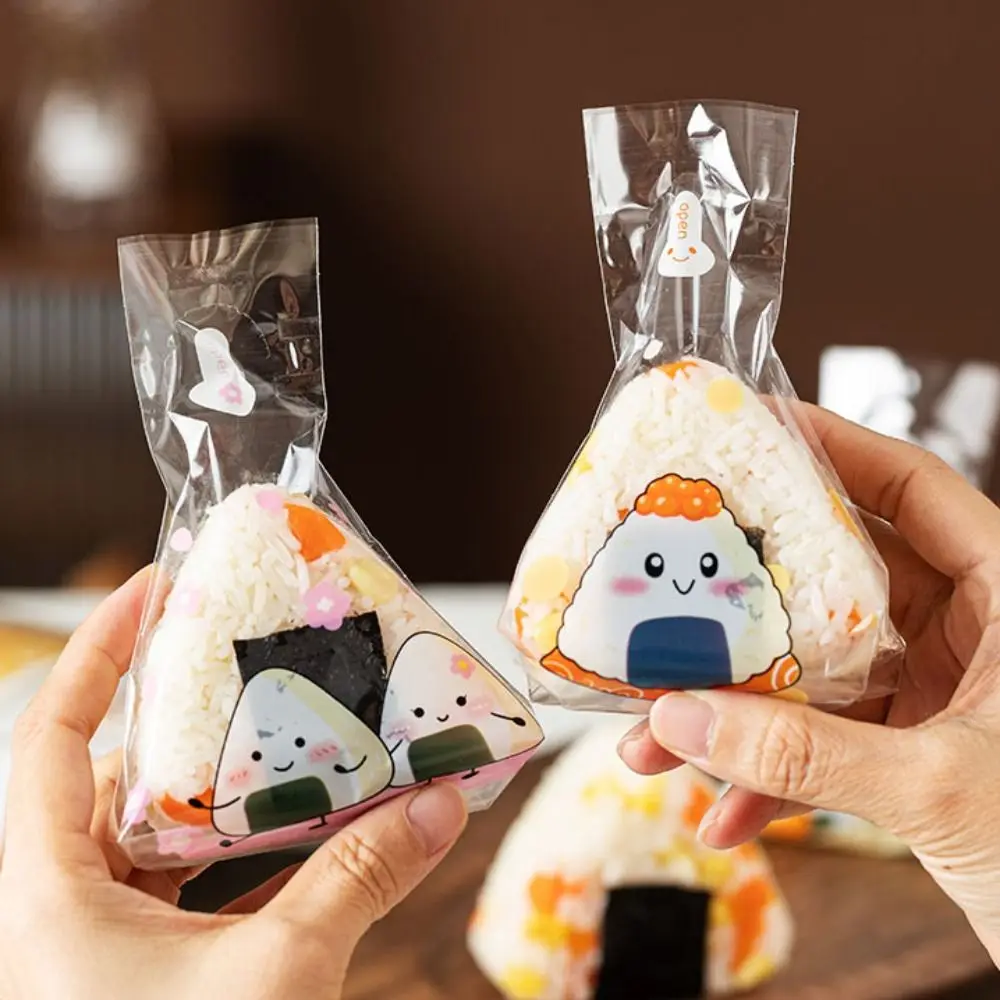 

100Pcs Disposable Triangle Rice Ball Packing Bag Transparent Japanese Rice Ball Wrapper Cartoon Pattern DIY Sushi Bag Business