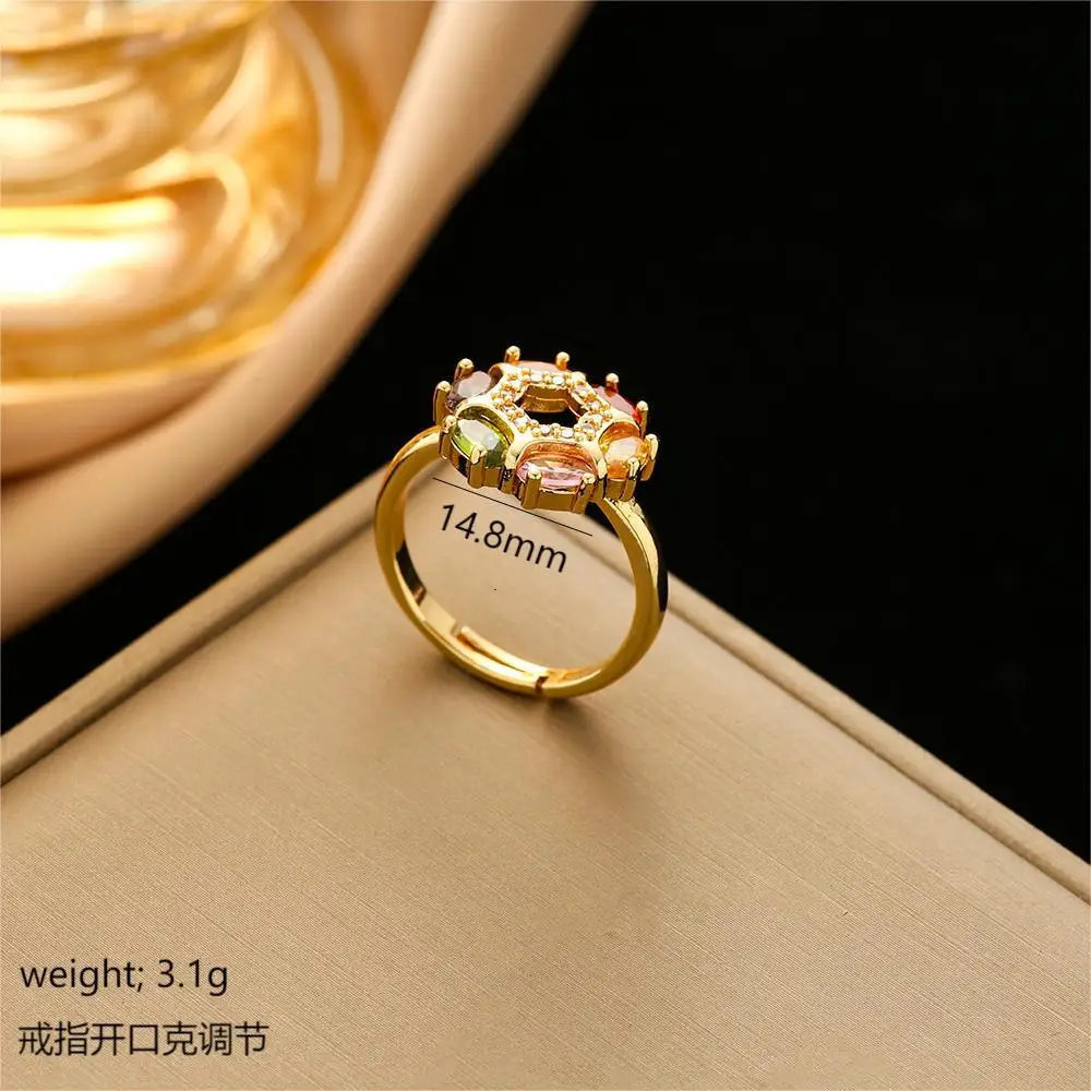 A circle of colorful diamond-encrusted necklace, women's earrings, ring three-piece set, circle titanium steel chain set