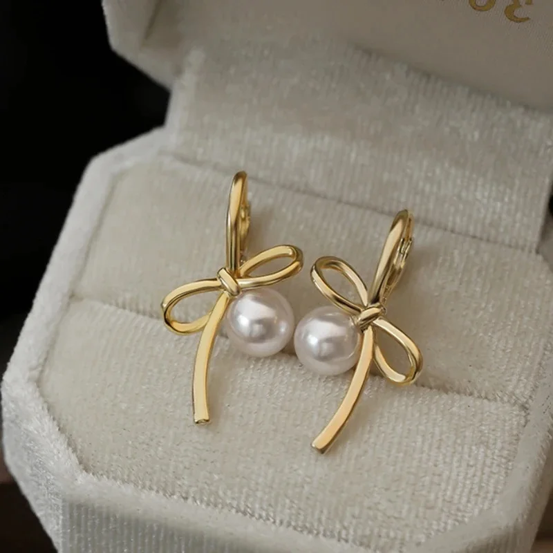 

Настоящее серебро 925 пробы с бантом и жемчужными линиями, милые серьги-гвоздики для женщин, милые ювелирные изделия, легкие роскошные аксессуары