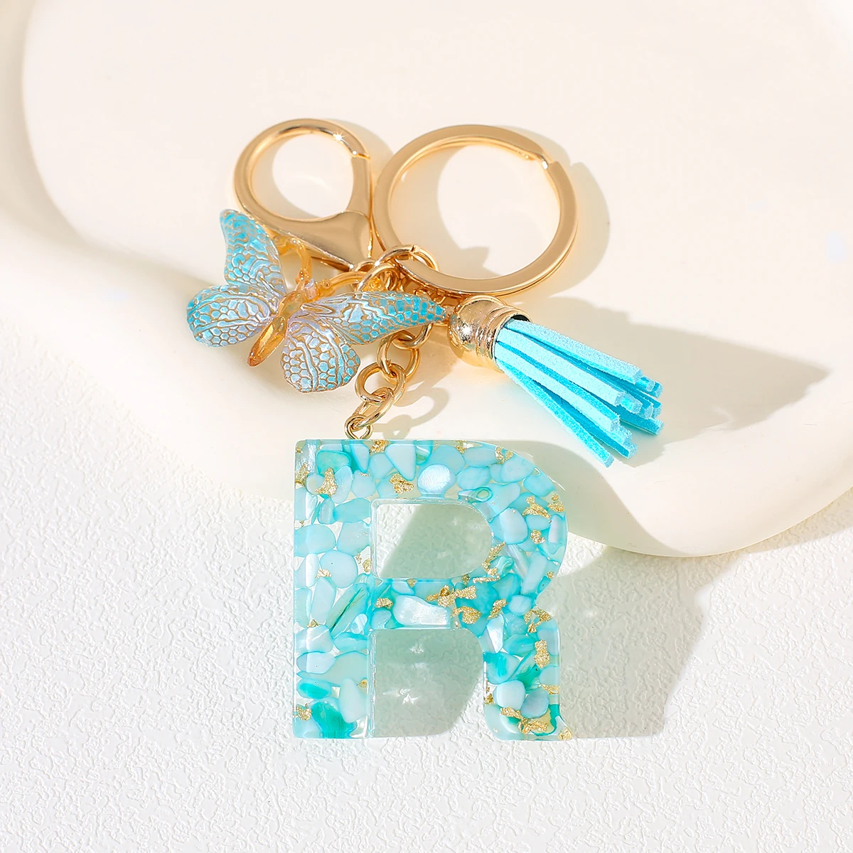 السماء الزرقاء الأبجدية رسالة المفاتيح مع فراشة هامش الراتنج حجر الأولي كيرينغ للنساء الإناث فتاة حقيبة الظهر قلادة M S