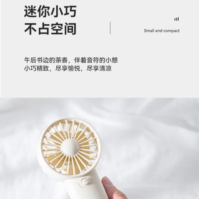 Multi-Color Compact Handheld Fan with Quiet Operation Portable Design and One-Touch Control for Home Office and Travel Available