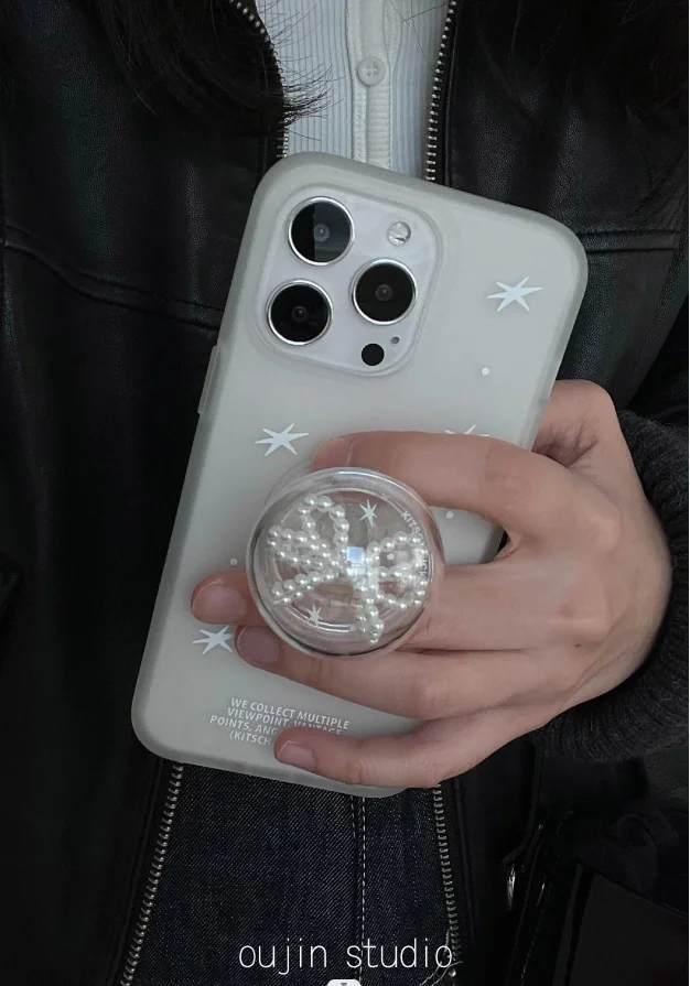 The same Korean Sweet Star print bow airbag phone holder is used for the telescopic desktop of the phone case