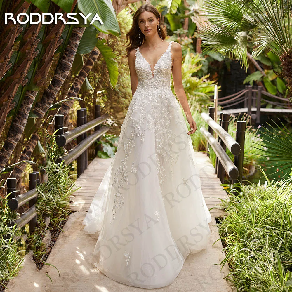 RODDRSYA Charming A Line Wedding Dresses For Bride V Neck Beach Spaghetti Straps Lace Backless Tulle Bridal Gown abito da sposa