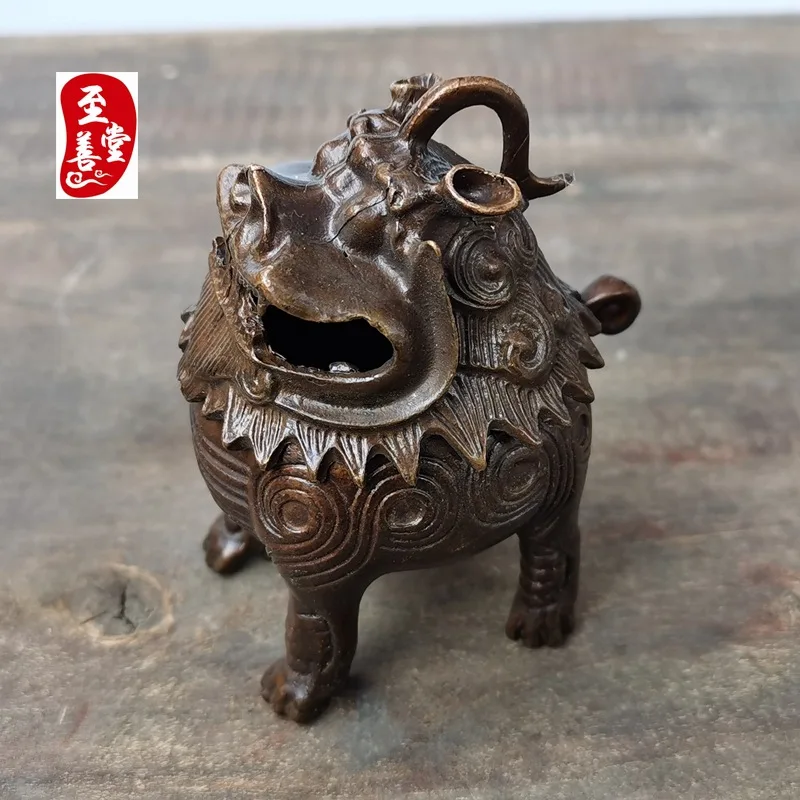 Antique-style copper incense burner with an aged patina, designed as a decorative piece for the living room, featuring mythical