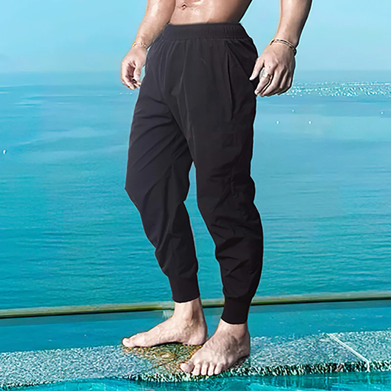 

2023 New Arrival Men Pants Bodybuilding Fitness Training Sports Trousers Men's Breathable Slim Beam Mouth Casual Pants Male