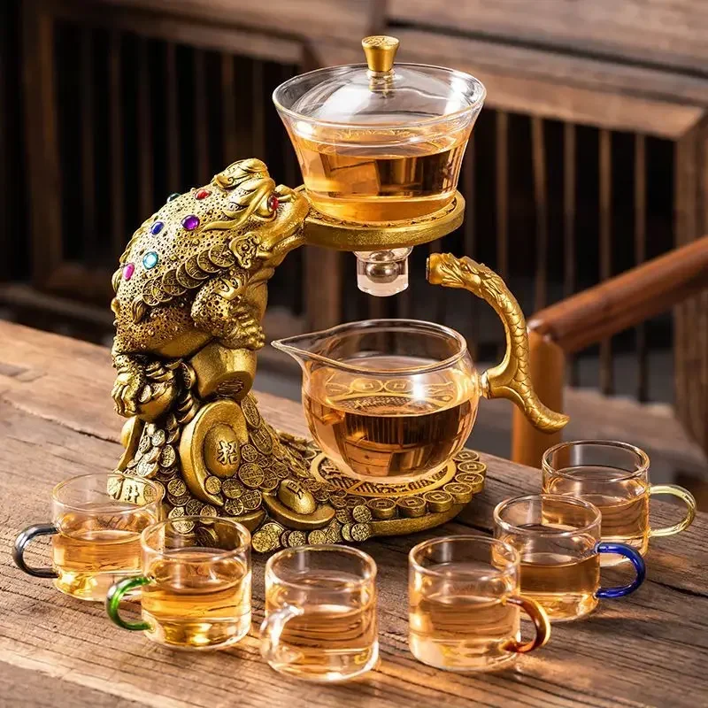 

Gold toad glass automatic tea set small suit home lazy tea artifact office high-end kung fu teapot.