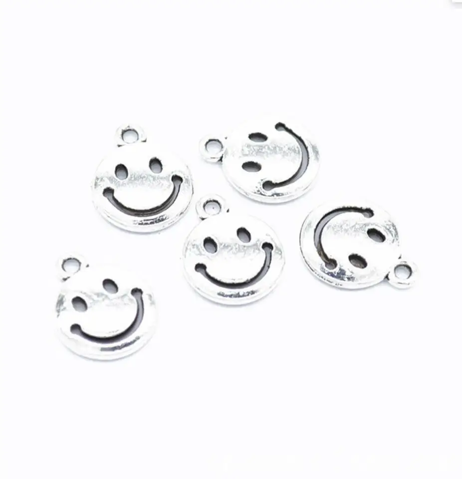 

200pcs/Lot 12x18mm Smiling Face Hollow Charms Antique Silver Color Pendants for DIY Jewelry Making Charm F0214