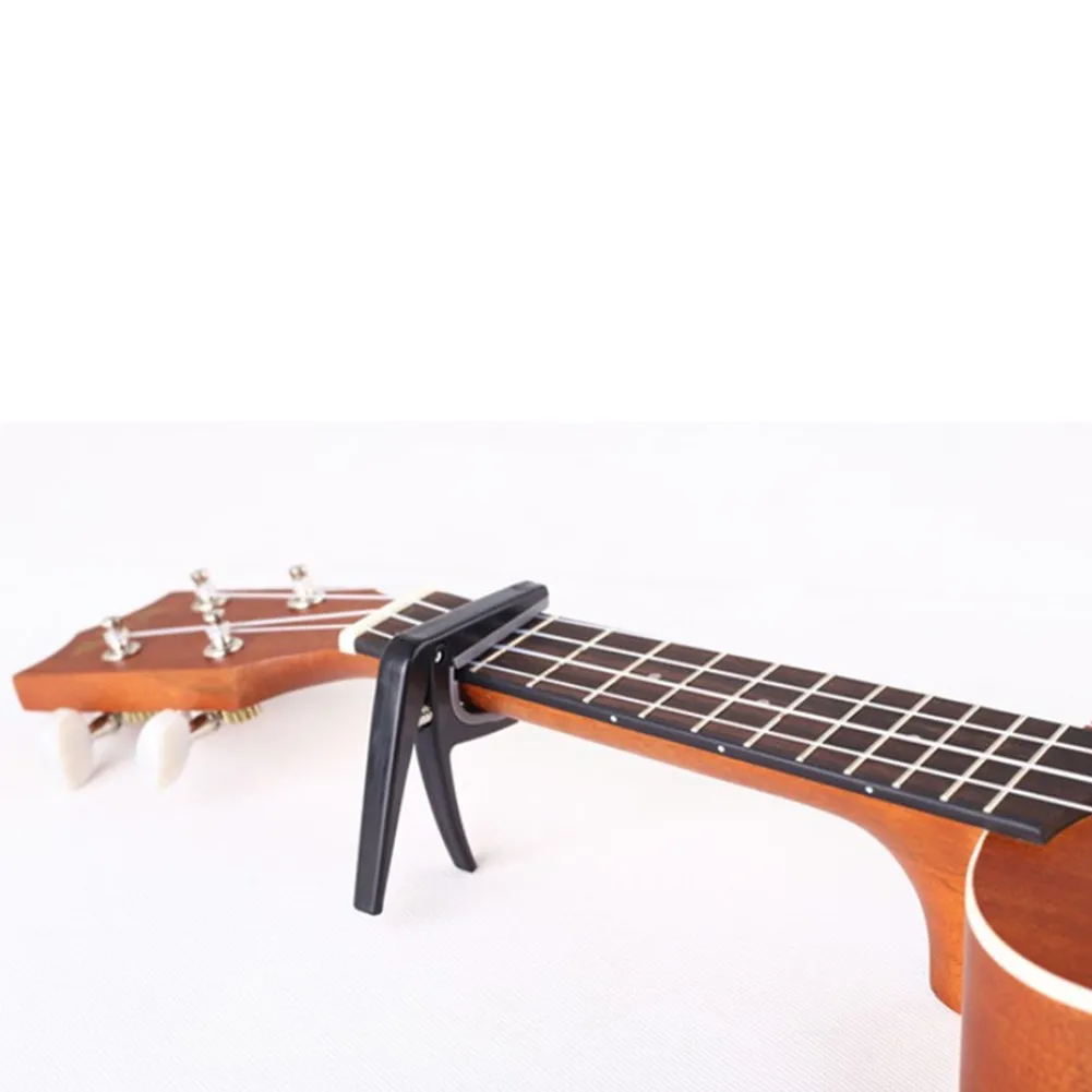 ABS Ukulele Capo Black For Tuning 6.6*6.6*1cm Hawaii Guitar Professional Quick Change Tuning Clamp Nice Portable