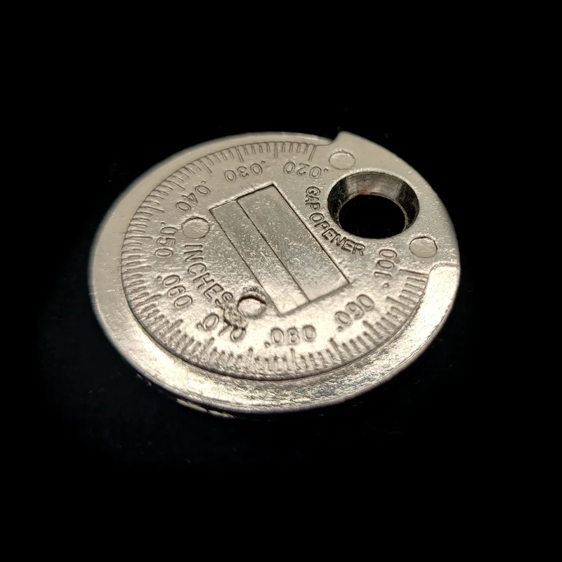 Herramienta de medición de espacio de bujía, tipo moneda, rango de 0,6-2,4mm, herramienta de espacio de calibre de bujía, 1 ud.