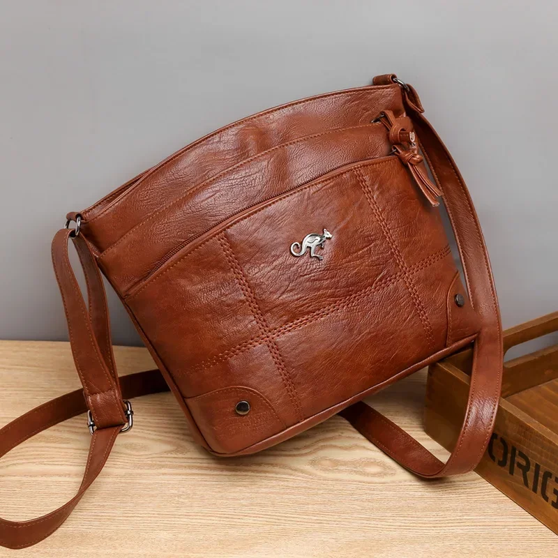 Bolso con textura de cuero suave para mujer, bandolera, nuevo bolso de hombro a la moda, tendencia Simple europea y americana, Retro, múltiples bolsillos