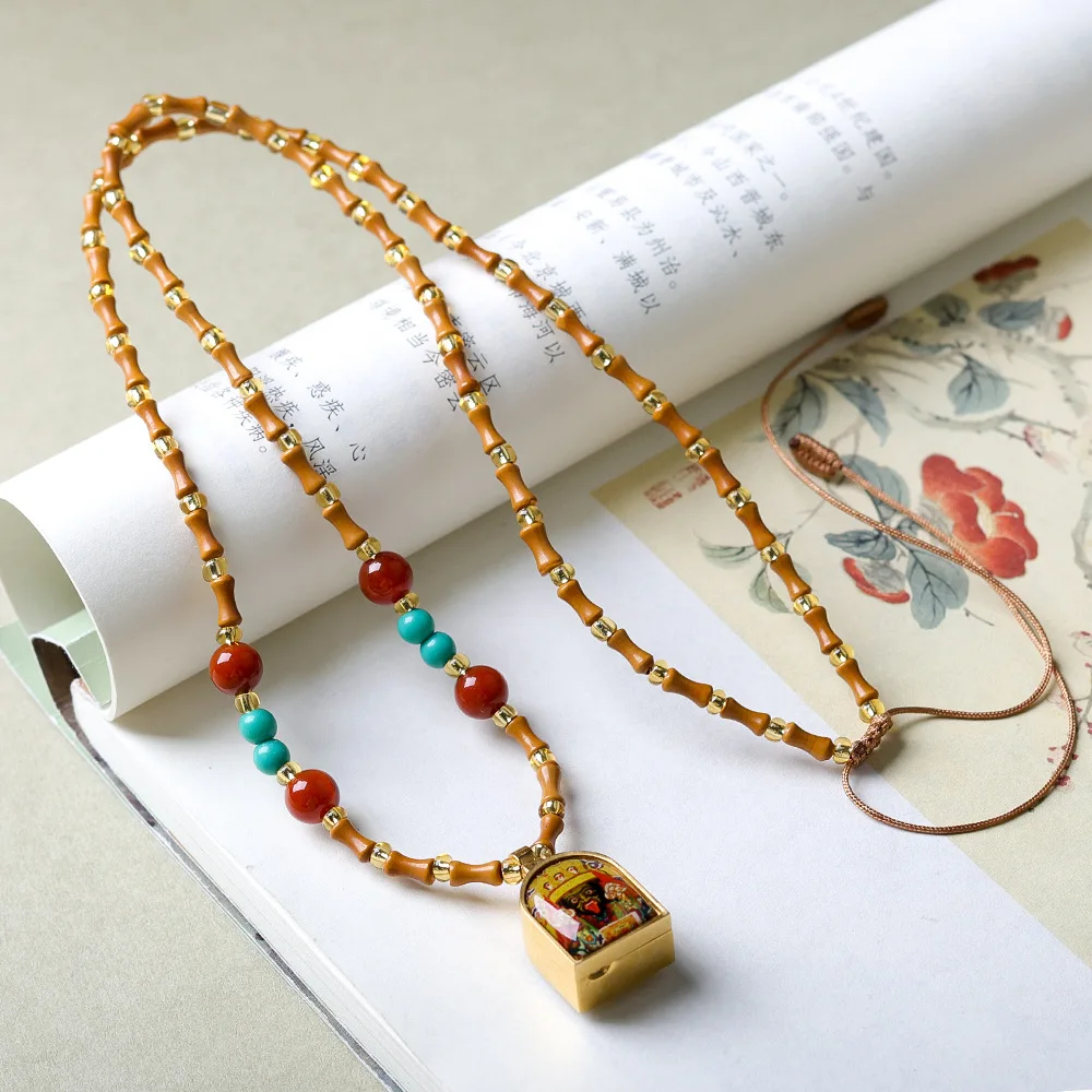 

Hand-woven olive kernel bamboo beads with zaki ramga Wu box necklace Wenchuan Chinese jumper chain necklace pearl necklace