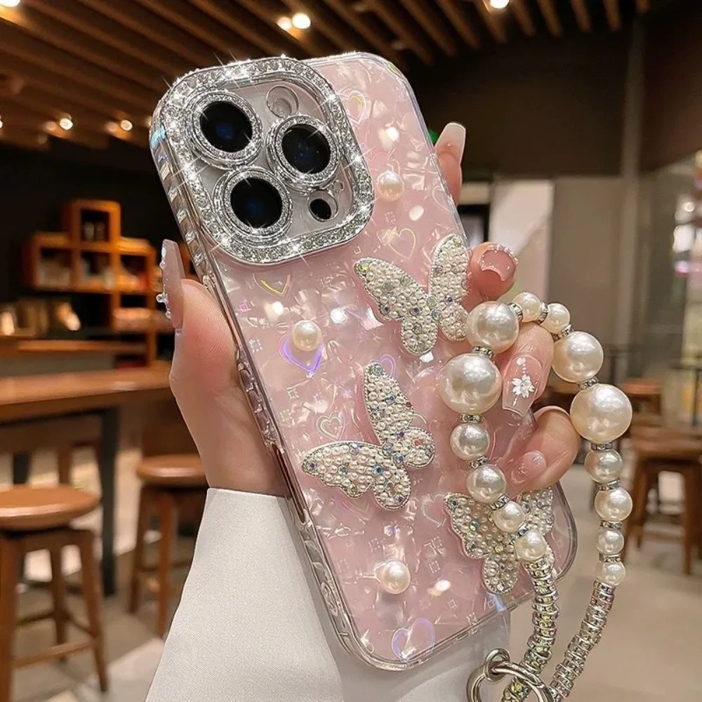 

Glitter Pearl Butterfly Wrist Chain Lanyard Phone Case for IPhone 15 16 17 Pro 13 12 11 14 Pro Max Plus Air Shell Pattern Cover