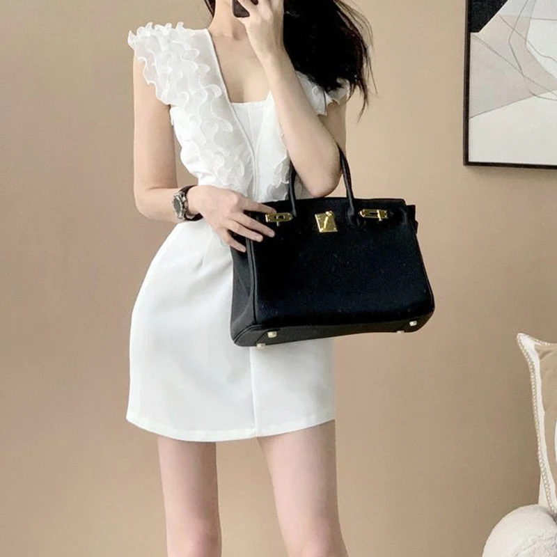 Summer 2024 new high-end dress with French design and suspender A-line skirt for women's wear