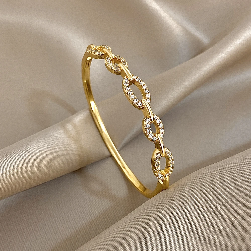 

Exquisite Gold Plated Zircon Bracelet Women Elegant Hollow Elliptical Spring Open Bangle Bracelet Wedding Party Jewelry Gift