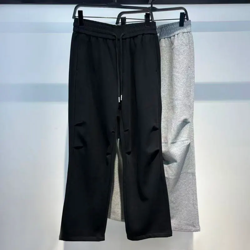 

Модные молодежные повседневные брюки для мужчин, весенне-осенние, свободные, широкие, спортивные, с эластичным поясом, в стиле Гонконг.