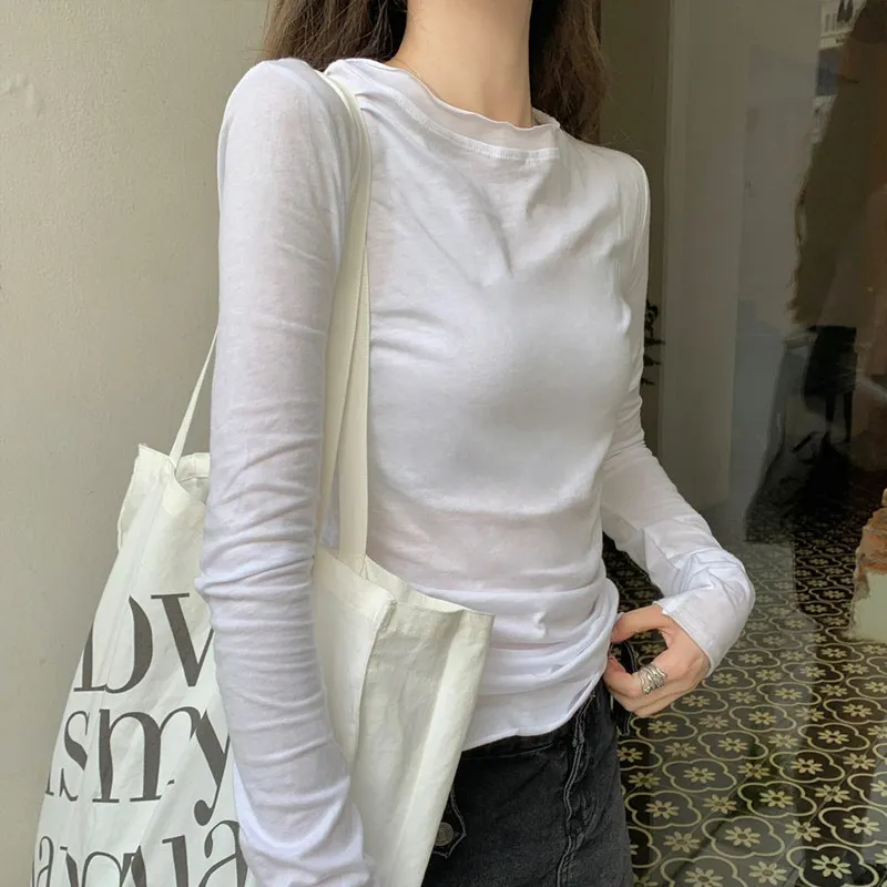 Casual wind round neck long-sleeved T-shirt female 2026 spring and autumn new loose Joker can be stacked in thin tops.
