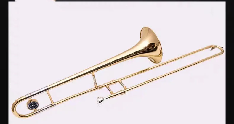 A brass lacquered gold trombone instrument with case in the flat B tone of the baritone