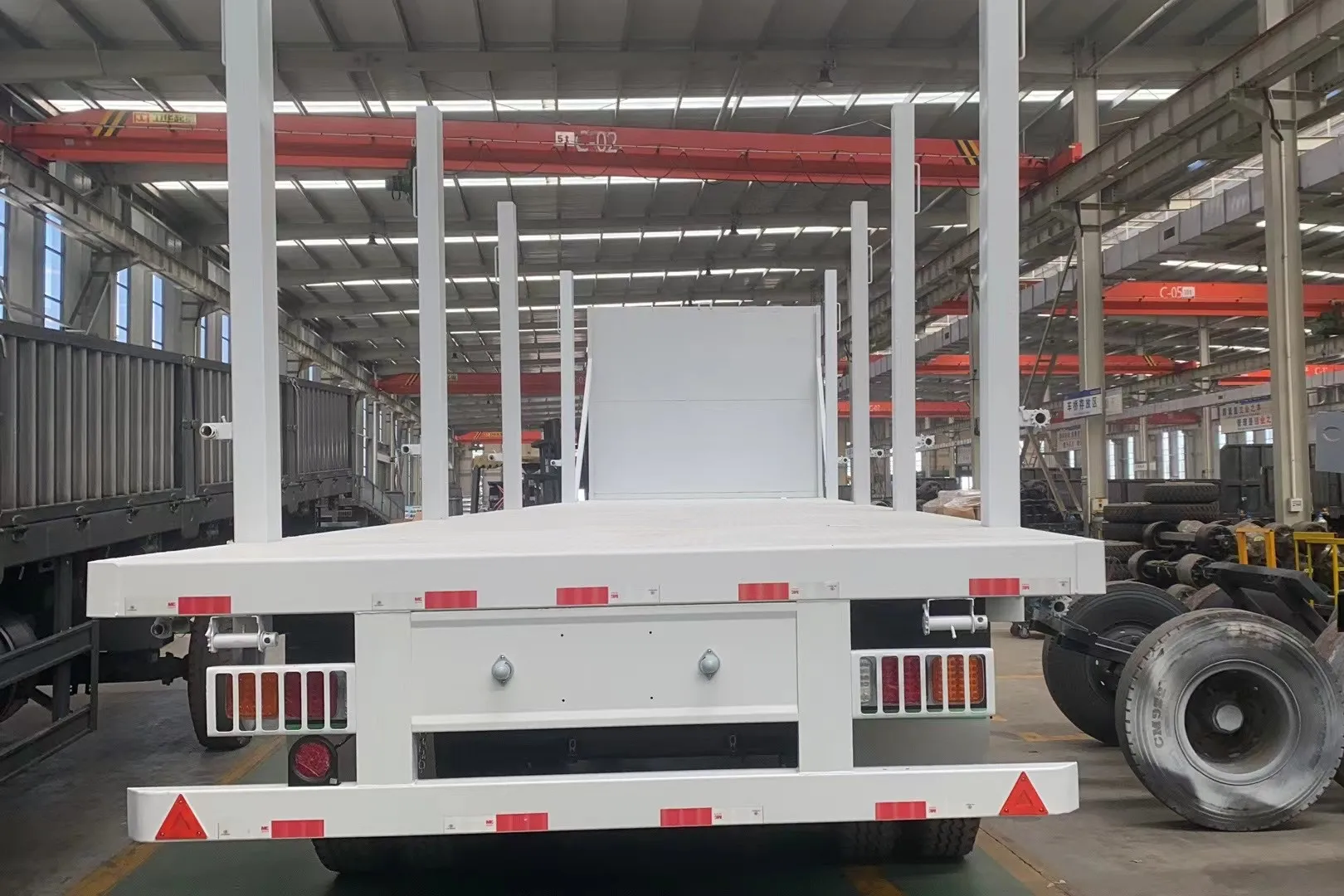 JKG Factory مخصص 40T أفضل بائع سرير مسطح شبه مقطورة 3 محاور للحاوية شبه مقطورة للحاوية #6