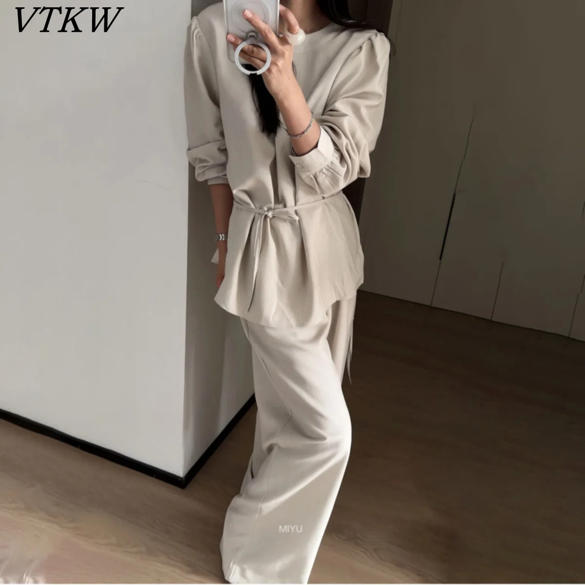 

VTKW 2026 New Arrival Women Two Piece Set Puff Sleeve Round Neck Blouse Self Tie Waist Textured Fabric Wide Leg Trousers Outfit