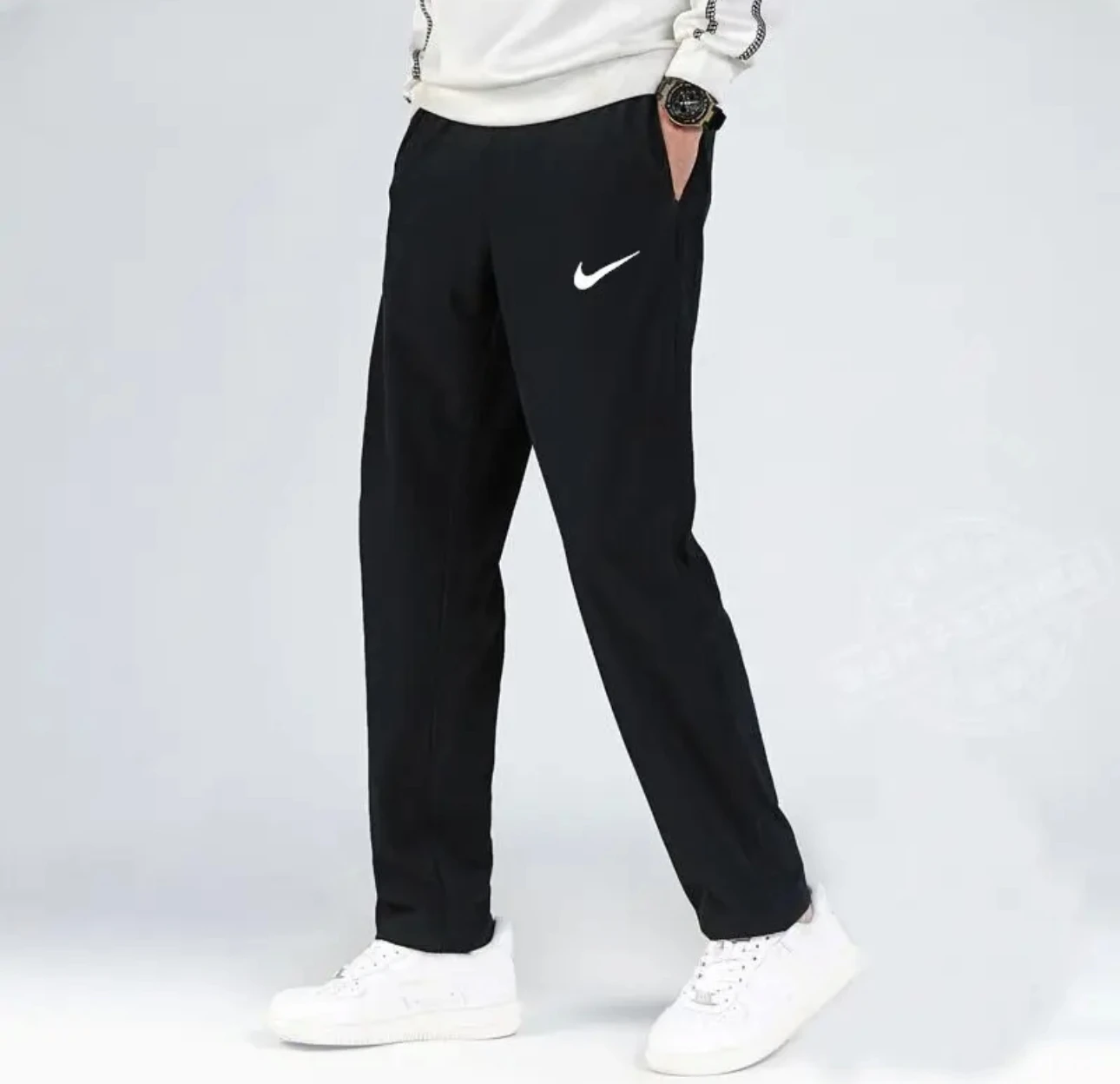 Nike Dri Fit Logo مطبوعة كاجوال فضفاض السرعة الجافة محبوك السراويل الرياضية للرجال أسود FB7491-010