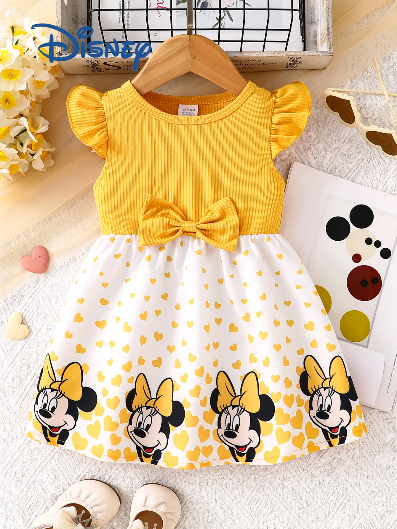 

Официально лицензированное летнее повседневное платье с Минни для маленьких девочек, трикотажное платье с развевающимися рукавами с бантом и принтом в виде сердца, удобная и мягкая детская одежда для повседневных прогулок, простая, милая, игривая и удобна