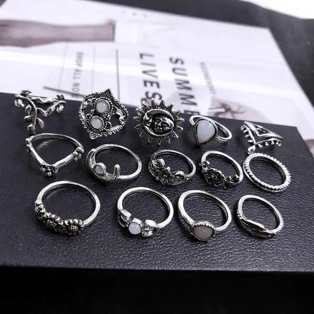 European and American cross-border new jewelry, fashionable sky engraved water drop flower sun combination set, 14-piece ring se