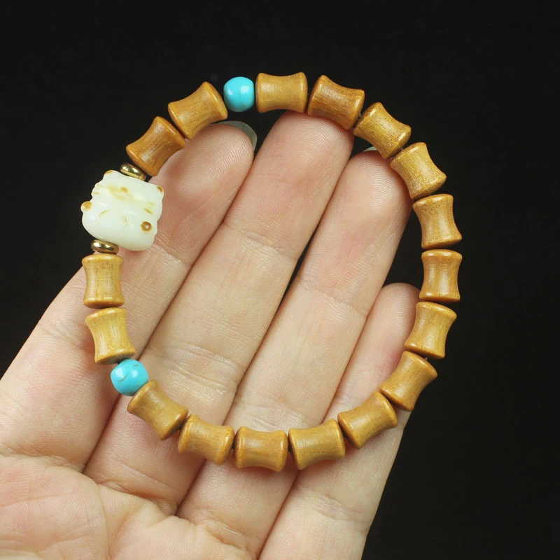 

Sandalwood bamboo knot 7*9 Buddhist prayer beads, charcoal-burned cat design, women's collectible bracelet jewelry