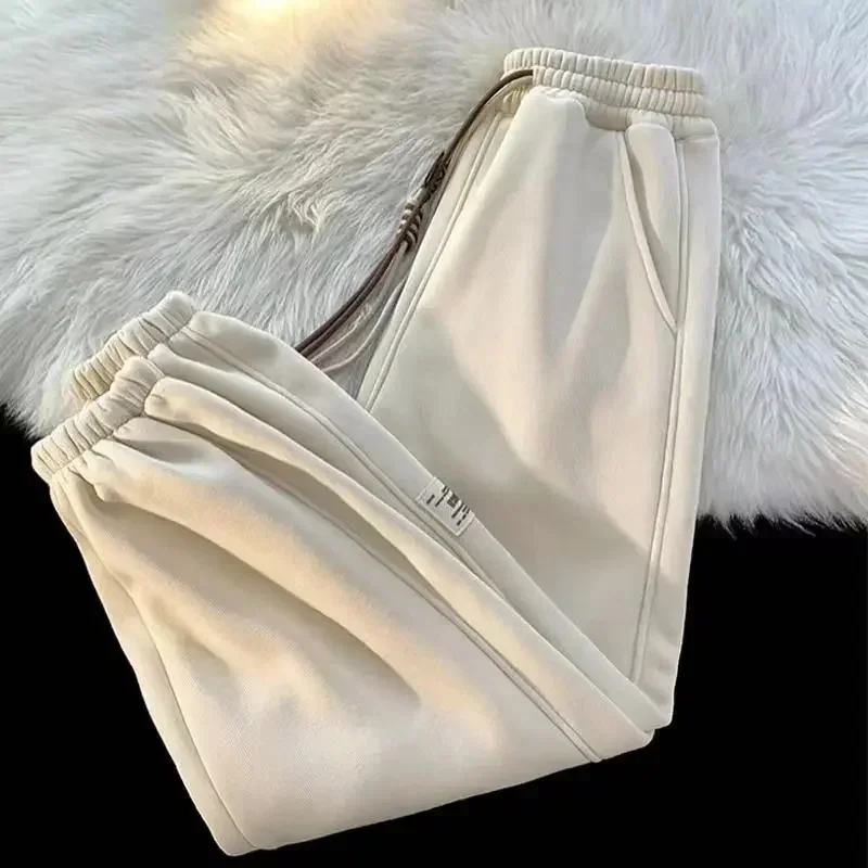 Sports men's and women's long pants, autumn and winter new loose casual versatile sanitary pants, plush and thickened solid colo