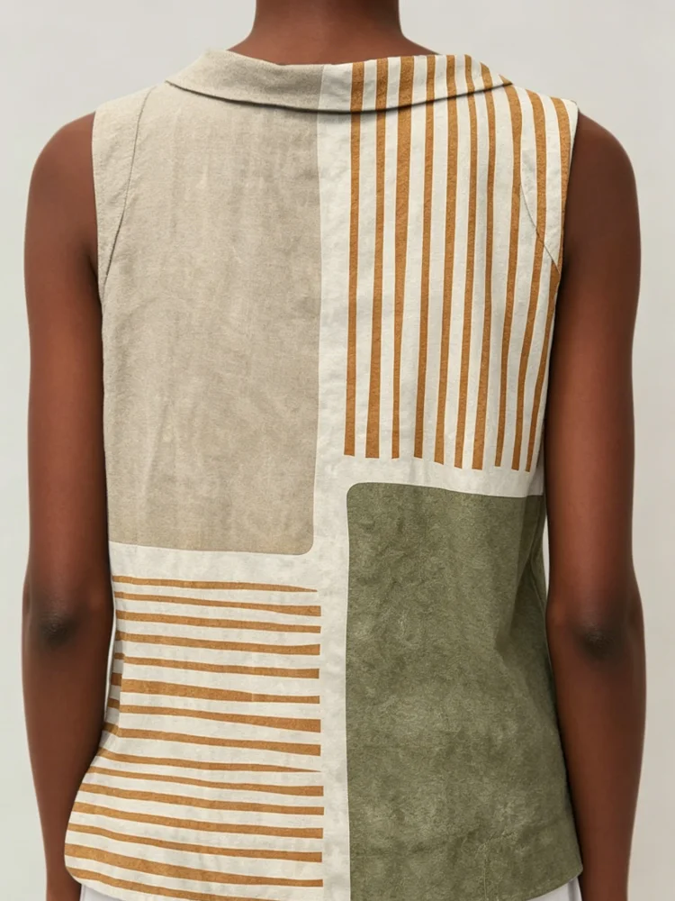 The Lady's Sleeveless Top Is Made of lightweight Linen Blend Fabric. It Features Neutral Color Blocks and Horizontal and Vertical Striped Patterns with Geometric Designs. The Loose Straight-Cut Style Is in American Sizing. It Is Shipped from The Warehouse