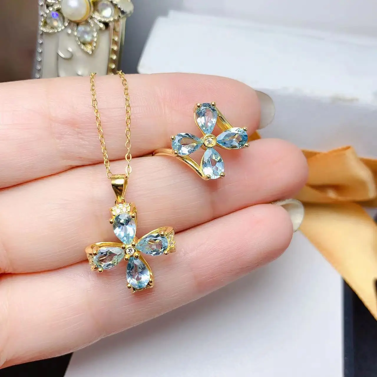 

925 Silver Natural Sky BlueTopaz Set Main Stone 4*6mm Pear Cut VVS Grade Topaz Ring and Necklace Pendant Plating with Gold