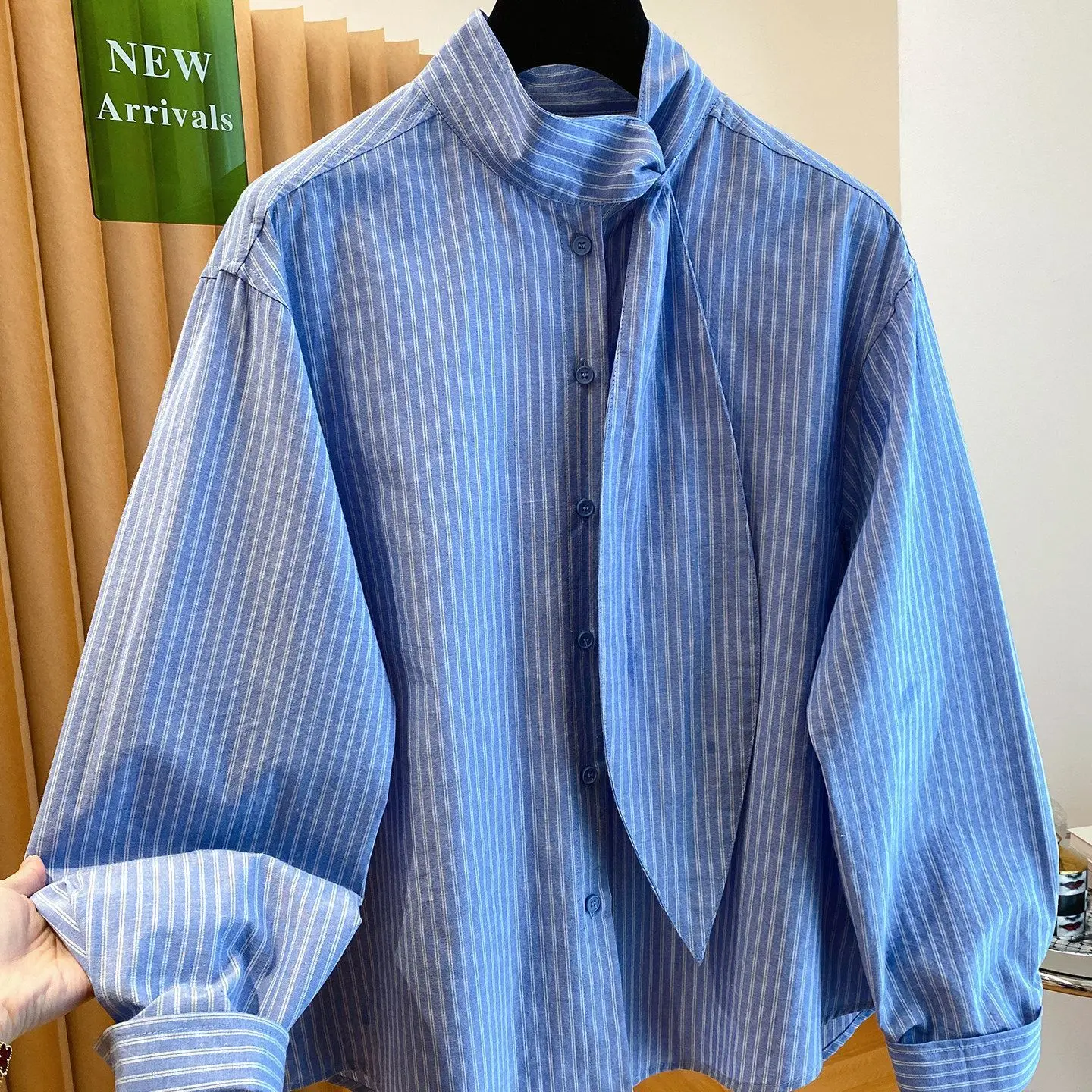 

Korean high-end blue striped shirt women's long-sleeved 2026 new early spring loose super good-looking top tide