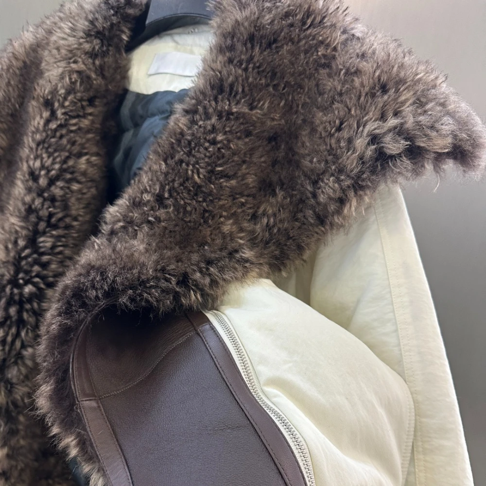 Manteau chaud épais de luxe pour femmes, doudoune canadienne de marque célèbre, veste en duvet d'oie blanche pour dames, zones de neige froide