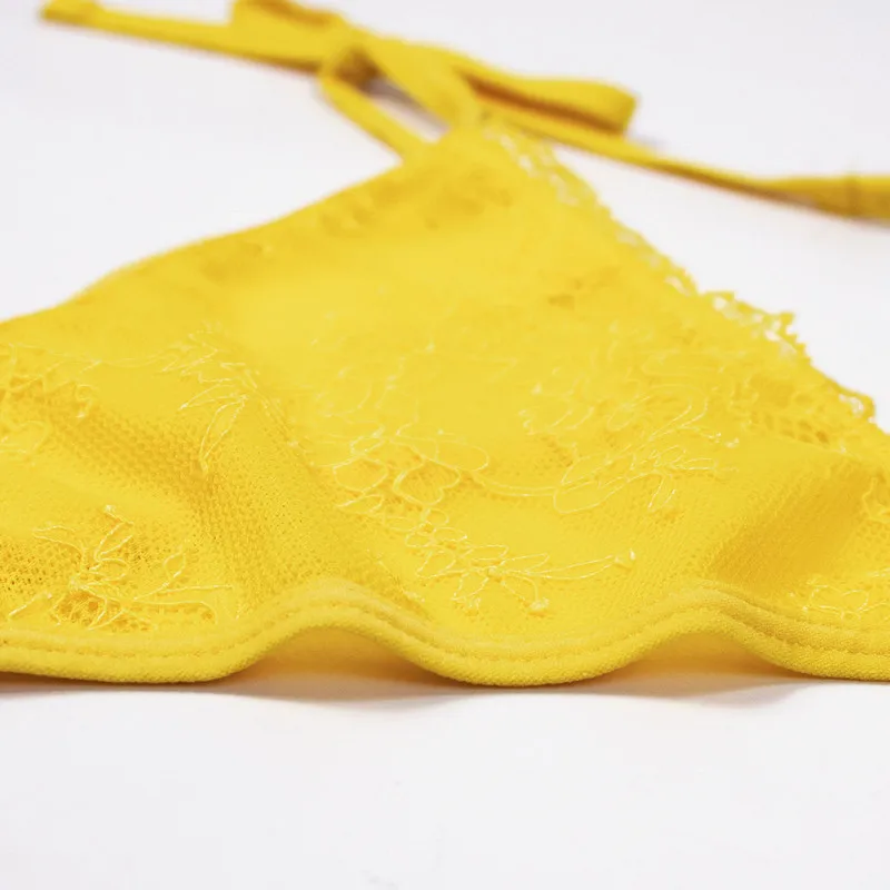 セクシーなレースのパンティー女性のための超薄型通気性透明 Tバックローウエストガール蝶ネクタイ無地クイックリリース T パンツ