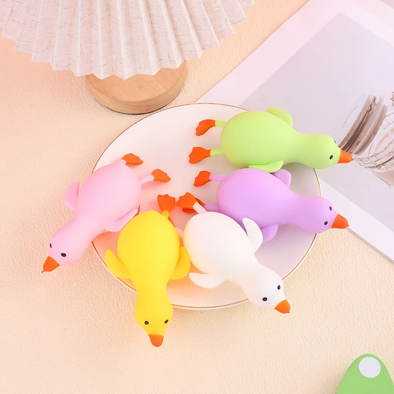 

Игрушка в форме утки, прыгающая и снимает давление, большая белая гуска, рельефная утка La La Duck, новинка с упаковкой