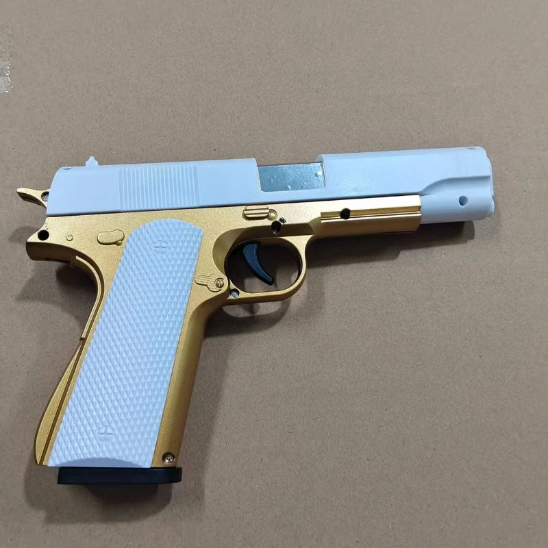 2026 Neu eingetroffen: Pop-Up-Spielzeugpistole mit weichen Kugeln, Gold-Weiß M1911 Kunststoffmodell, Outdoor-Spiel, Geschenk für Jungen und Kinder – Detail 5