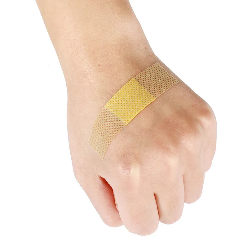 50 pçs/lote Não-tecido Tecidos de Primeiros Socorros Band-aid Respirável Banda Remendo Dedo Curativo Da Ferida Curativo Adesivo Gesso Degola