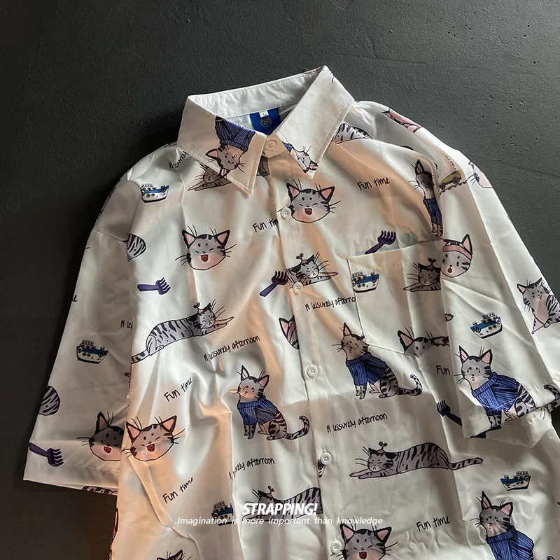

Japanese Harajuku Cat Cartoon Printed Shirts Hip Hop Men Fun Graphic Tops Short Sleeve Lapel Shirt Single Breasted Blouse Women