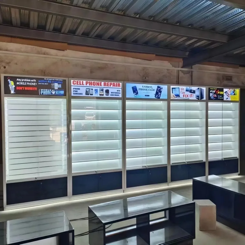 custom.Custom Cellphone Repair Shop Decoration Modern Mobile Phone Display Shelves LED Lighting Slat Wall Display High Quality - view 4