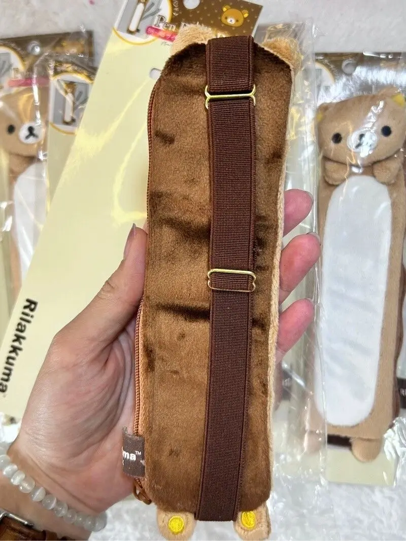 Nowe śliczne Rilakkuma Korilakkuma Mini pluszowe piórniki dla dziewczynek dzieci niedźwiedź szkolny Anime etui na długopisy opaska pojemnik